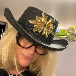 Awesome cow girl hat beautiful for wearing out on the town, golden detail.